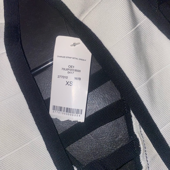 Extra small beautiful and super sexy Bebe dress with tags attached. ❤️ - Picture 4 of 5